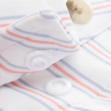Closeup of collar snaps on collar of shirt