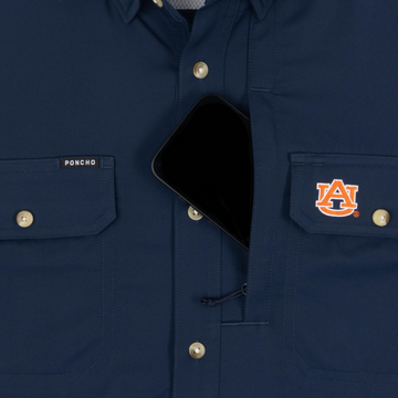 phone in chest zipper pocket of shirt