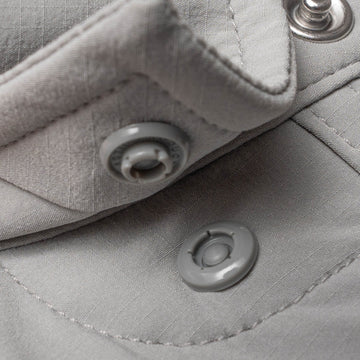 Closeup of collar snaps on collar of shirt