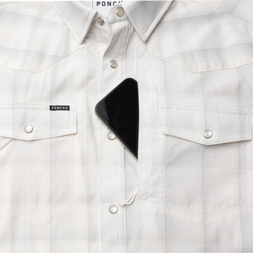 Phone in chest zipper pocket of shirt