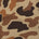 Brown and tan camouflage fabric pattern with irregular shapes