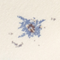 Close-up of blue and brown ink stain on light fabric background